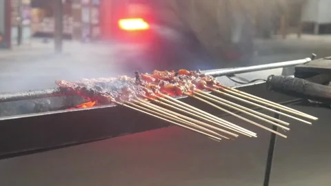 The process of grilling chicken satay Stock Footage 323364878