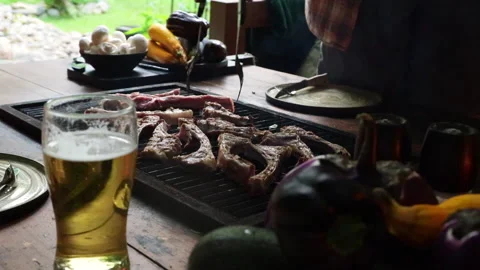 The process of grilling meat on the table Video stock 280185767