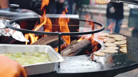 Process of grilling vegetables on smoker grid, man using cooking tongs for Stock-Footage 201546701