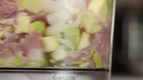 Process of grinding chicken fillets 스톡 동영상 162107786