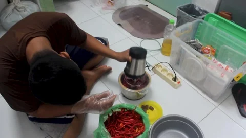 The process of grinding chilies Stock Footage 276151490