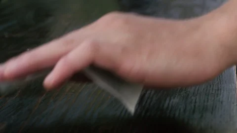 Process of grinding a wooden table Stock Footage 95008450