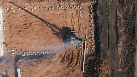 The process of hammering piles for the foundation of the building. Special Stock Footage 157694556