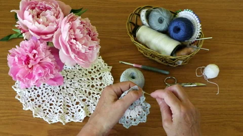 The process of hand crocheting lace napkin Stock Footage 201730878