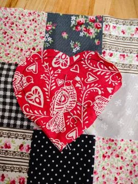 Process of hand made sewing project of applique heart. Stock-Fotos