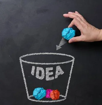 Process of idea rejection and creative improvement, hand throwing crumpled... Stock Photos