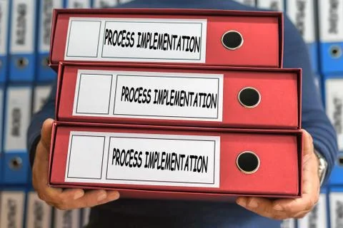 Process Implementation concept words. Folder concept. Ring binders. Stock Photos
