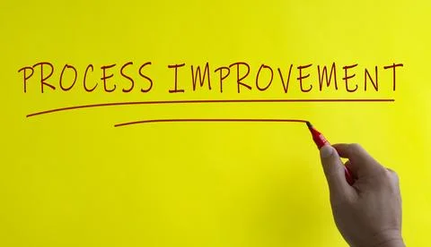 Process improvement text on missing jigsaw with red color background. Proce.. Stock Photos