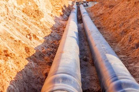 The process of installation of the distribution unit heating network. Stock Photos