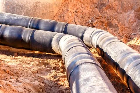 The process of installation of the distribution unit heating network. Stock Photos