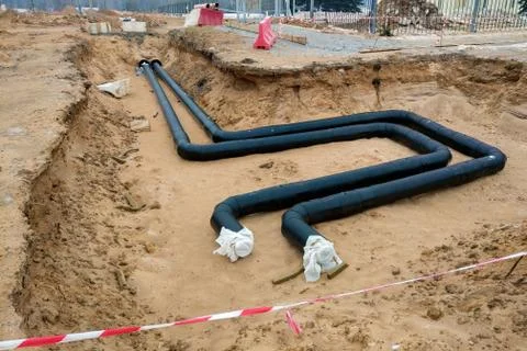 The process of installation of the distribution unit heating network. Frame f Stockfoto's