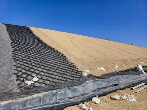 Process of installing geosynthetics and clay cover in mine fills Stock Photos