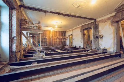 The process of installing new floor from double-tee girder and wooden joist in Stock Photos