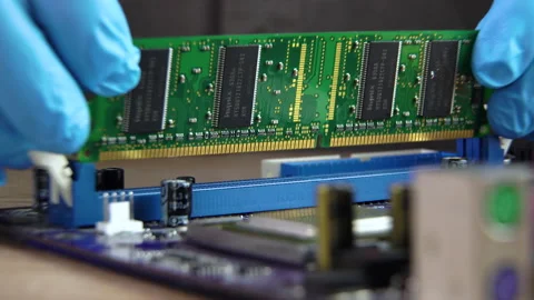 The process of installing RAM on a computer motherboard Stock Footage 144809734