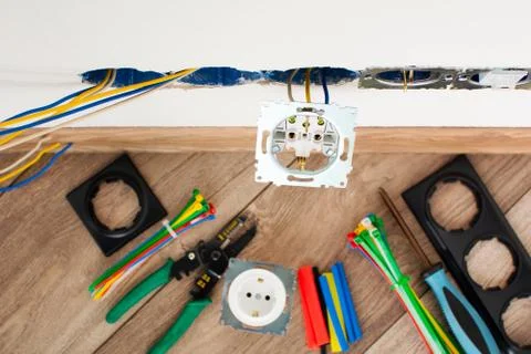 The process of installing sockets in the house. 写真素材