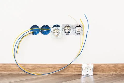 The process of installing sockets in the house. Stock Photos