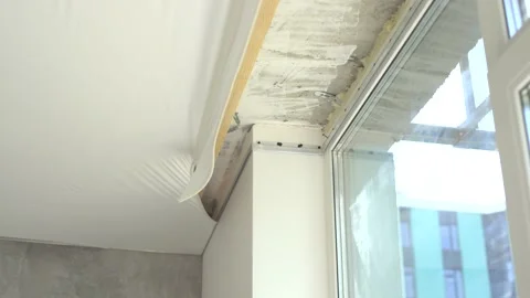 Process of installing stretch ceiling in the hall. Stock Footage 161872755