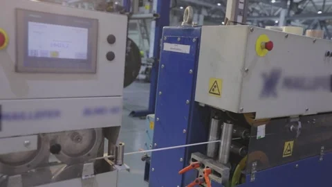 The process of insulation in a modern factory. Modern unit for industrial wire Stock Footage 158453305