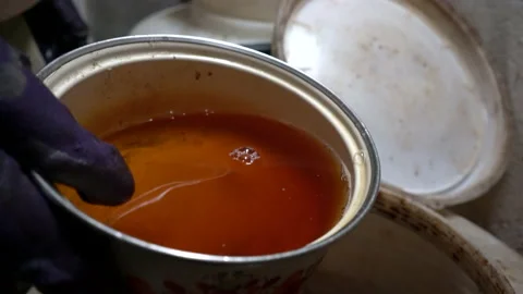 Process of juice fermentation into Natural Apple Cider Vinegar (Acetum), health Stock Footage 149218282
