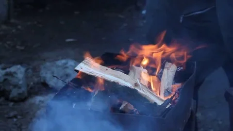The process of kindling a fire in the grill Video stock 76441140