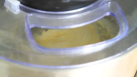 Process of kneading dough in food processor. Preparation of dough for baking in Stock Footage 220539949