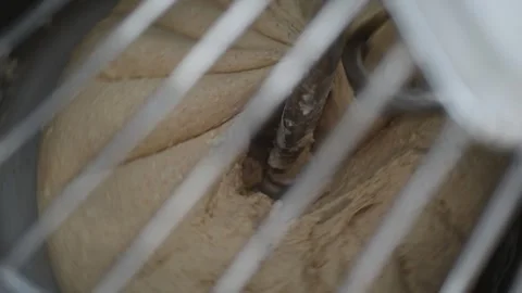 The process of kneading dough with an industrial kneading machine. Stock Footage 263073108