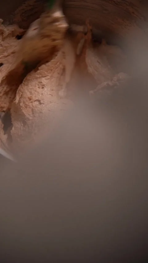 The process of kneading dough for macaroons. Sweet holiday pastries. Slow motion Stock Footage 294720449