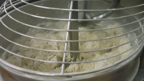 Process of kneading the dough with the mixer Video stock 77734855