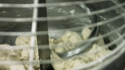 Process of kneading the dough with the mixer Stock Footage 77739112