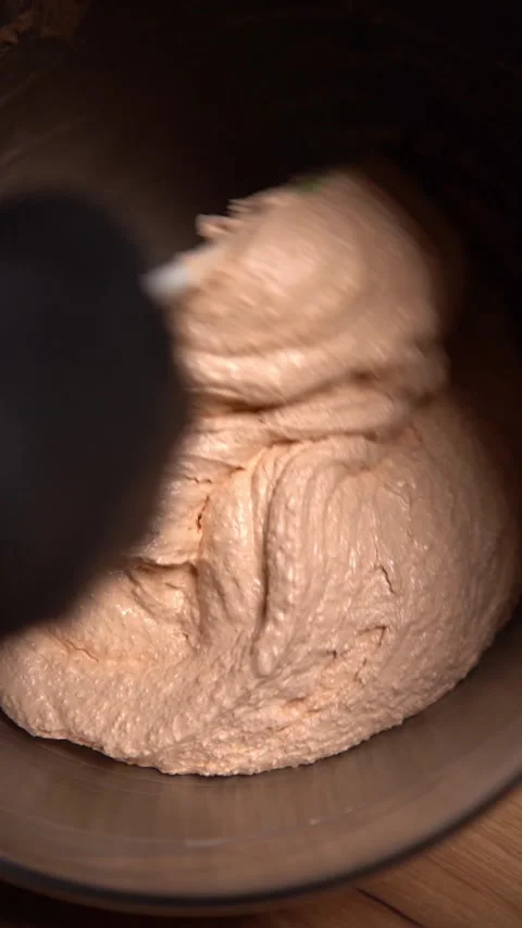 The process of kneading macaroon dough. Pink, sticky mass for sweets. Slow motio Stock Footage 294720450