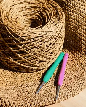 The process of knitting a raffia bag Stock Photos