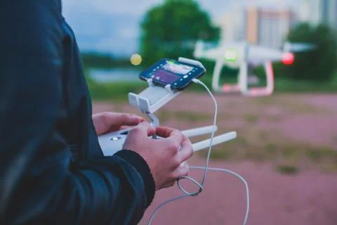 A process of launching the quadcopter drone with camera, operator launches qu 스톡 사진