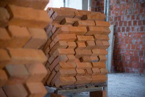 The process of laying bricks on construction site 스톡 사진