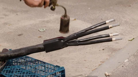 The process of laying a new high-voltage cable underground. Splicing, connecting Stock Footage 279003779