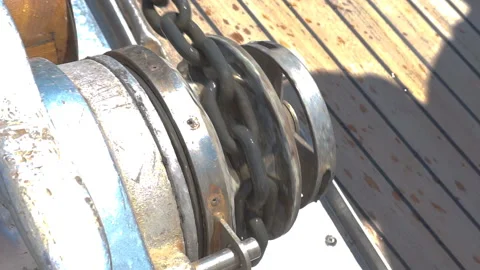 The process of lifting the anchor using a windlass. Stock Footage 111950844