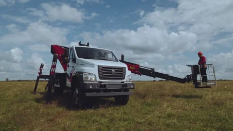 The process of lifting an auto-hydraulic lift Stock Footage 281853935