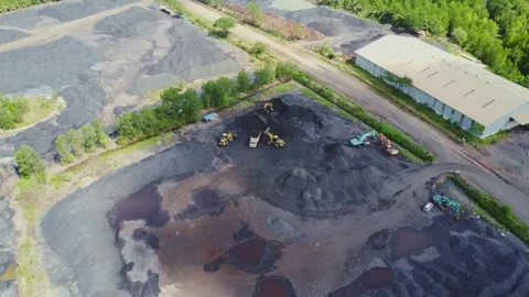 The process of loading coal into dump trucks Stock Footage 263611737