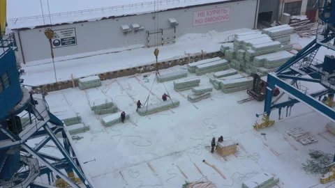 The process of loading a ship in the port in winter. Stock Footage 155908997