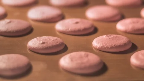 Process of macarons baking in oven with left-to-right camera motion Stock Footage 97331293