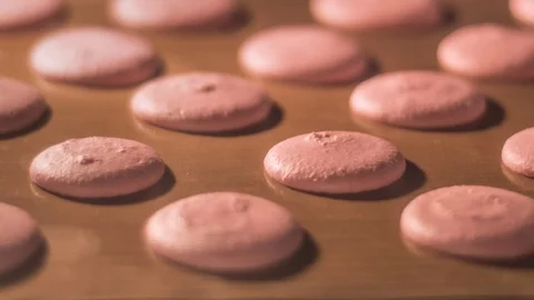 Process of macarons baking in oven mitt. Close up 4K footage Stock Footage 97303566