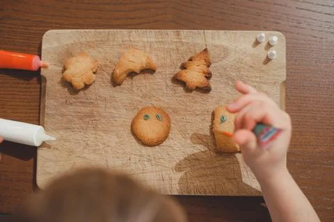 Process of making and decorating a traditional homemade Christmas gingerbread Stock Photos