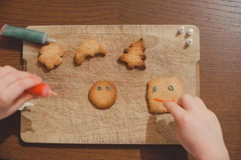 Process of making and decorating a traditional homemade Christmas gingerbread Stock Photos