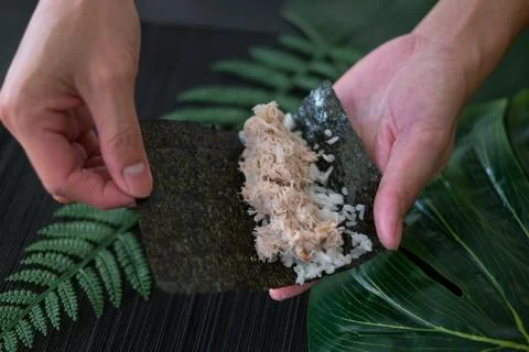The process of making and decorating tuna Temaki Hand Roll. Stock Photos