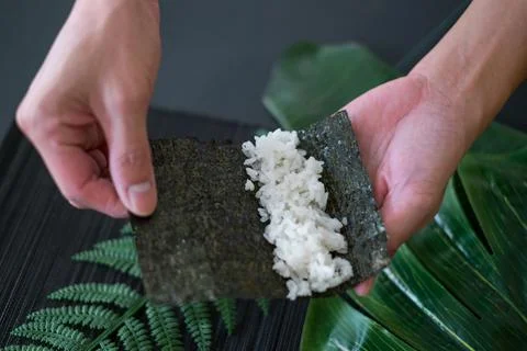 The process of making and decorating tuna Temaki Hand Roll. Stock Photos