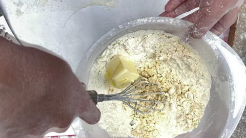 Process of making and whisking dough. Home cooking with care for relatives. Stockbeeldmateriaal 135123332