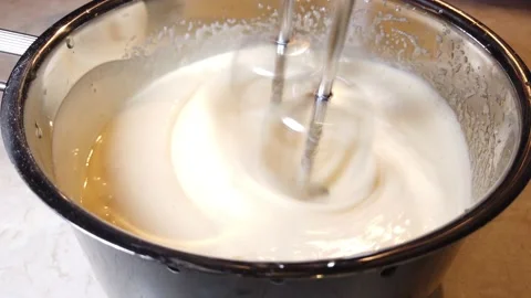 Process of making and whisking the dough mixer, liquid dough with whisk in bowl. Stock Footage 155934341