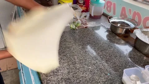 The process of making Badung egg martabak  Stock Footage 253404610