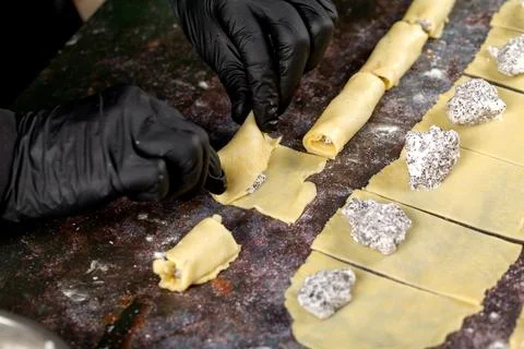 The process of making bagels with nuts and poppy seeds 스톡 사진