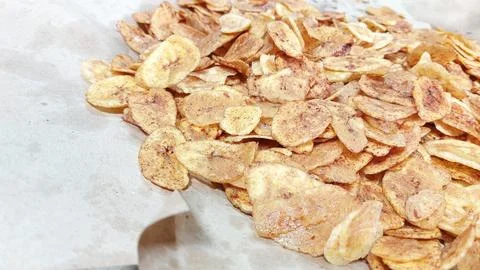The process of making banana chips Stock Photos