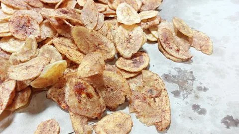 The process of making banana chips Stock Photos